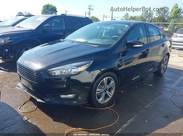 1FADP3FE4HL335196 2017 FORD FOCUS Black Vista tres cuartos delantera izquierda