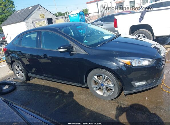 1FADP3FE4HL335196 2017 FORD FOCUS Black Vista interior trasera