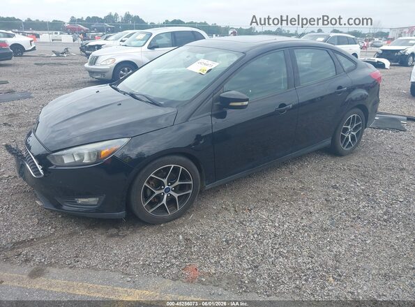 1FADP3H24HL261975 2017 FORD FOCUS Black Vista tres cuartos delantera izquierda