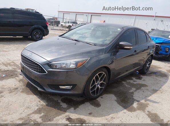 1FADP3H27HL332974 2017 FORD FOCUS Gray Առջևի ձախ երեք քառորդ տեսարան