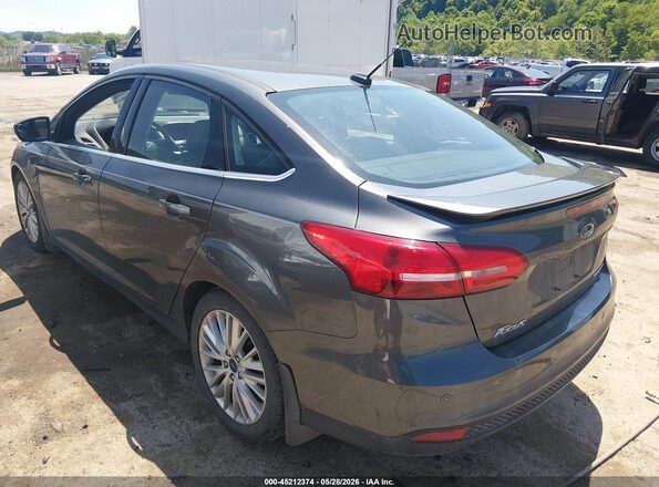 1FADP3J24HL340072 2017 FORD FOCUS Gray Trasero izquierdo