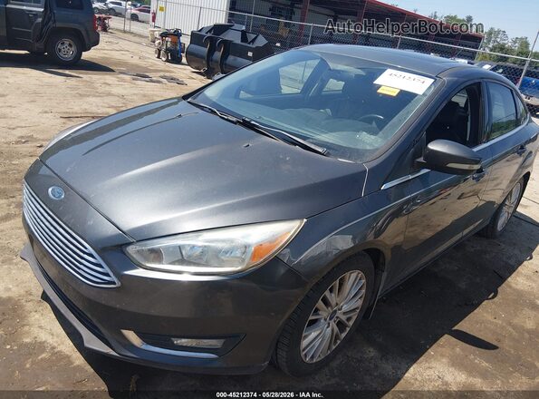 1FADP3J24HL340072 2017 FORD FOCUS Gray Vista tres cuartos delantera izquierda