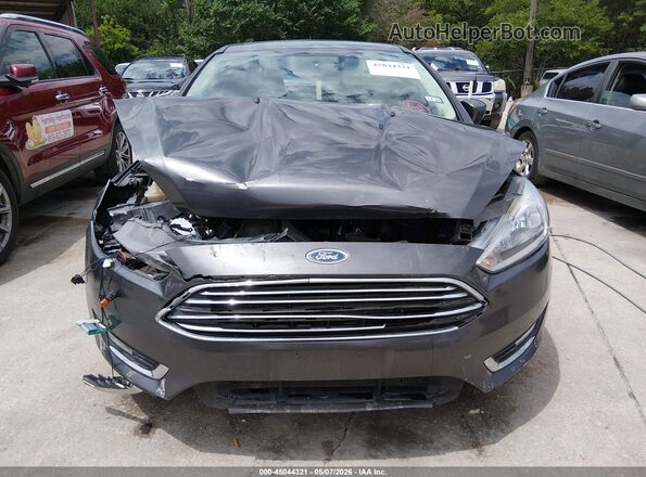 1FADP3J27JL233104 2018 FORD FOCUS Gray Вид задньої частини салону