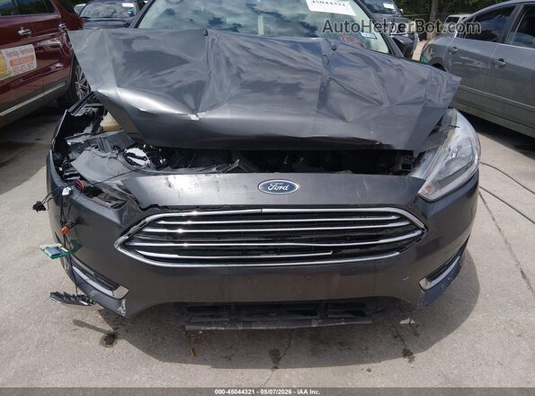1FADP3J27JL233104 2018 FORD FOCUS Gray Вид спереду