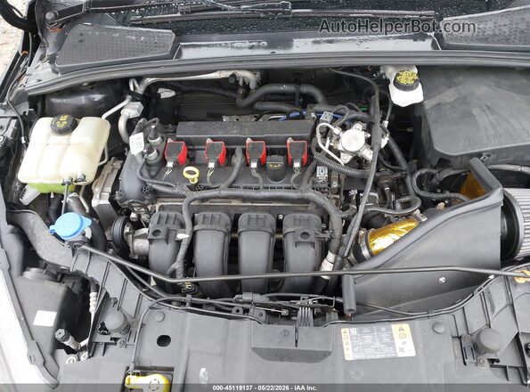 1FADP3N25JL332675 2018 FORD FOCUS Black Rear view