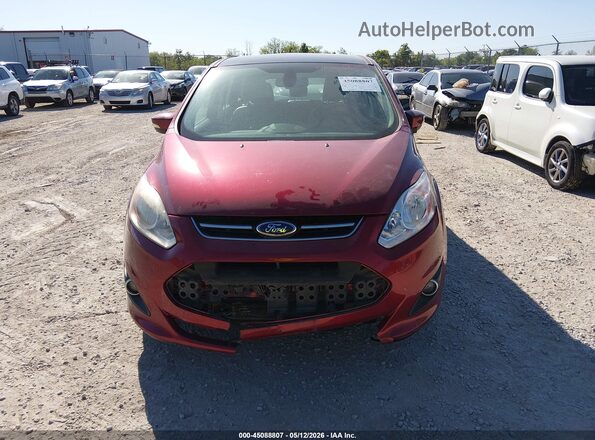 1FADP5CU0GL107198 2016 FORD C-MAX ENERGI Red Widok wnętrza z tyłu