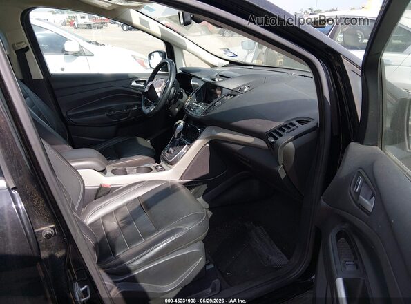 1FADP5CU0GL115527 2016 FORD C-MAX ENERGI Black Front interior view