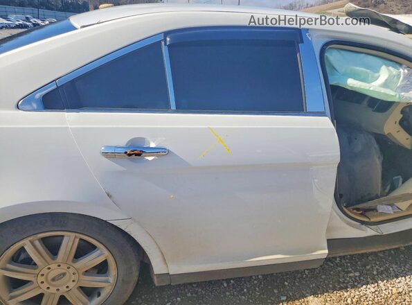 1FAHP2D80GG148733 2016 FORD TAURUS White Vista de los asientos traseros
