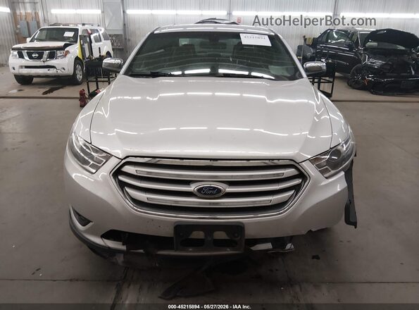 1FAHP2F88GG111037 2016 FORD TAURUS Silver Rear interior view