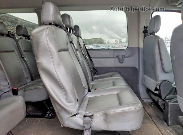 1FBAX2XM9GKB15736 2016 FORD PASSENGER Red Rear interior view
