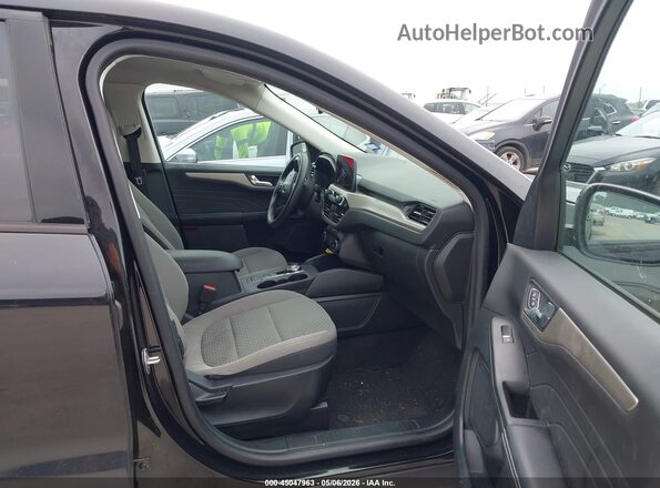 1FMCU0G6XMUA47560 2021 FORD ESCAPE Черный Вид салона спереди