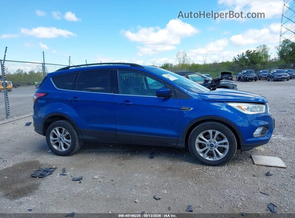 1FMCU0GD0HUF03215 2017 FORD ESCAPE Blue Widok wnętrza z tyłu