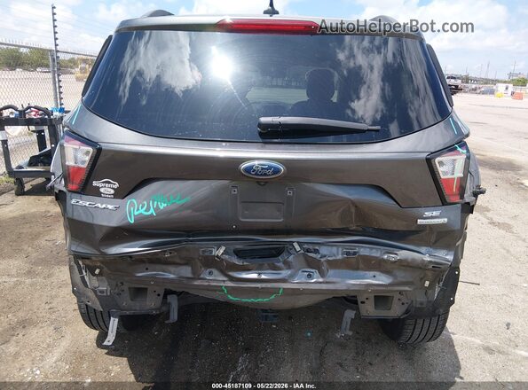 1FMCU0GD0JUB36130 2018 FORD ESCAPE Gray Դիմացի տեսք