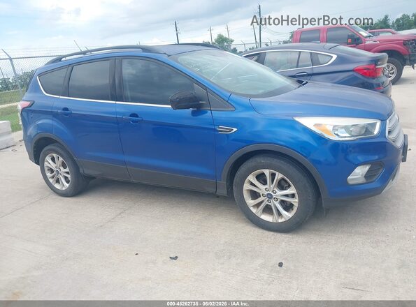 1FMCU0GD2JUC18800 2018 FORD ESCAPE Blue Սալոնի հետևի տեսք