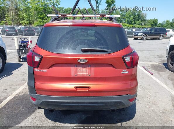 1FMCU0GD7KUA06928 2019 FORD ESCAPE Оранжевый 