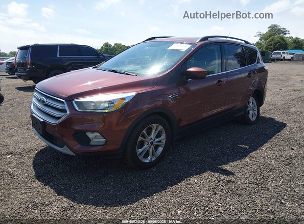 1FMCU0GD8JUA40326 2018 FORD ESCAPE Dark Brown Vista tres cuartos delantera izquierda