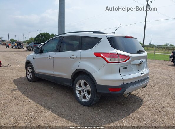 1FMCU0GX0GUB71480 2016 FORD ESCAPE Silver Trasero izquierdo