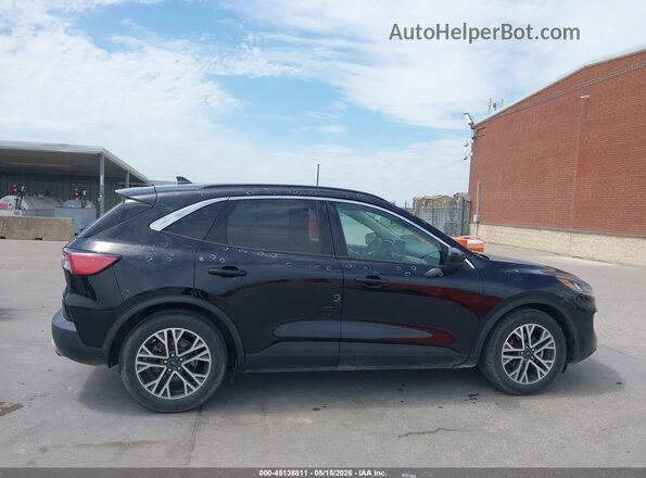 1FMCU0H65LUC40132 2020 FORD ESCAPE Черный Вид задней части салона
