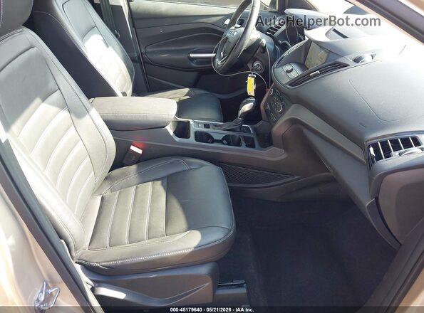 1FMCU0HDXJUA69437 2018 FORD ESCAPE Gold Widok wnętrza z przodu
