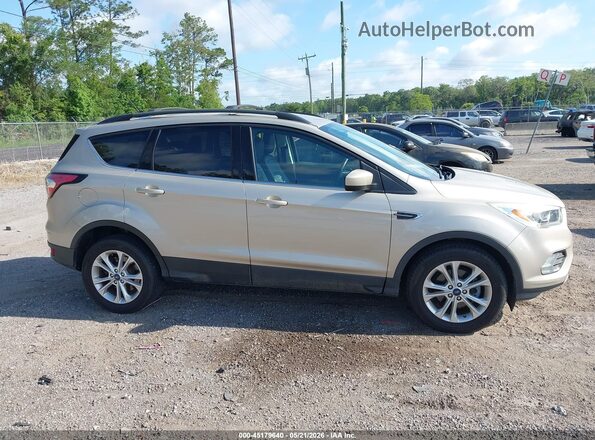 1FMCU0HDXJUA69437 2018 FORD ESCAPE Gold Widok wnętrza z tyłu