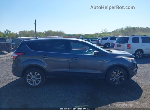 1FMCU9G91HUD99088 2017 FORD ESCAPE Gray Widok wnętrza z tyłu