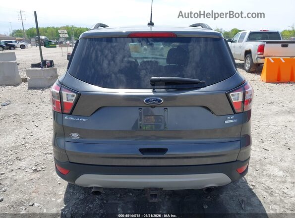 1FMCU9G93HUC56661 2017 FORD ESCAPE Gray 