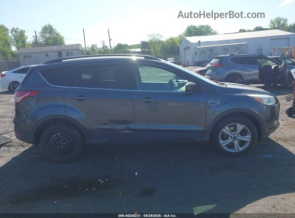 1FMCU9G94GUB78616 2016 FORD ESCAPE Gray Widok wnętrza z tyłu