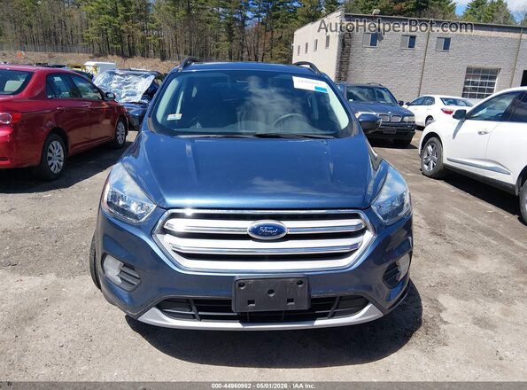 1FMCU9GD1JUB75779 2018 FORD ESCAPE Синий Вид панели приборов