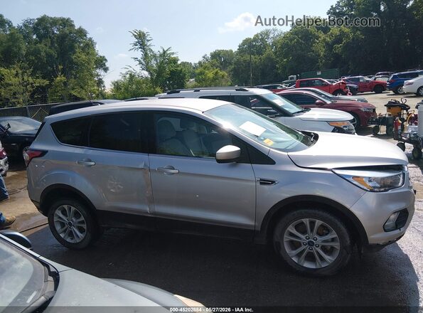 1FMCU9GD2HUC25454 2017 FORD ESCAPE Silver Widok wnętrza z tyłu