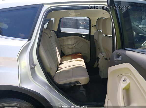 1FMCU9GD2HUC25454 2017 FORD ESCAPE Silver Widok naklejki z numerem VIN