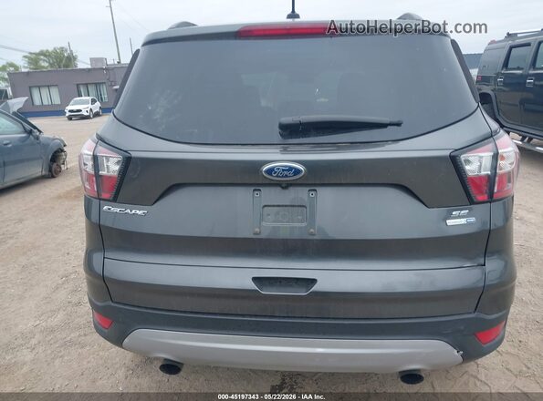 1FMCU9GD4JUD35847 2018 FORD ESCAPE Gray 