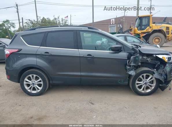 1FMCU9GD4JUD35847 2018 FORD ESCAPE Gray Vista interior trasera