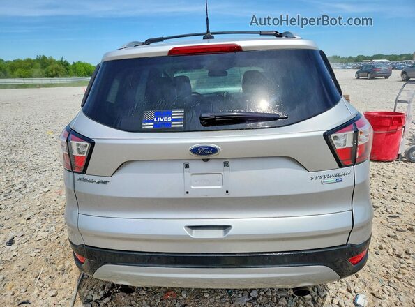 1FMCU9J90JUC41209 2018 FORD ESCAPE Silver Vista trasera