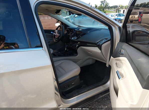1FMCU9J99HUE18365 2017 FORD ESCAPE Tan წინა სალონის ხედი