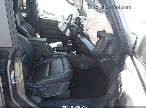 1FMDE7BH7TLA66834 2026 FORD BRONCO Gray Вид салону спереду