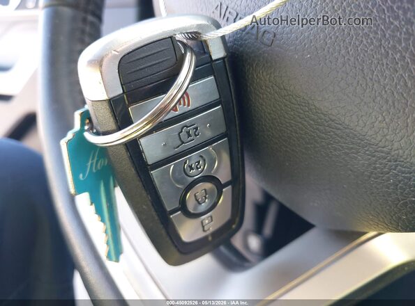 1FMSK7DH3MGA60570 2021 FORD EXPLORER Gray Widok deski rozdzielczej