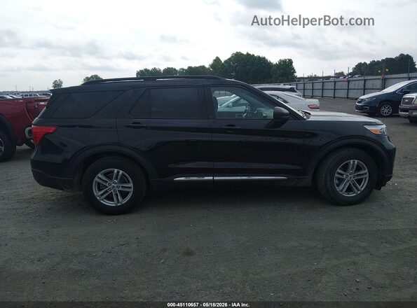 1FMSK7DH4NGA29393 2022 FORD EXPLORER Black Rear interior view