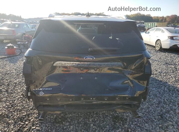 1FMSK7FH6NGA56706 2022 FORD EXPLORER Black Rear view