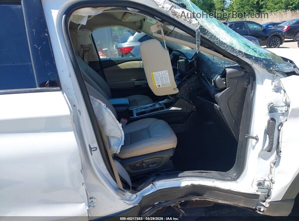 1FMSK7FH7MGB50544 2021 FORD EXPLORER White Vista interior delantera