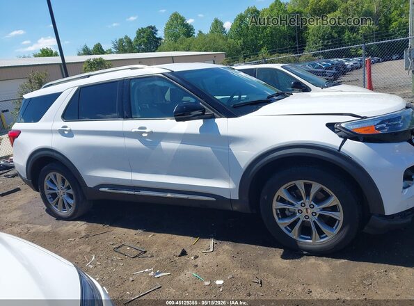 1FMSK8FH8MGA88464 2021 FORD EXPLORER White Vista interior trasera