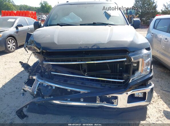 1FTEW1C52JFB30488 2018 FORD F150 Black Widok z przodu