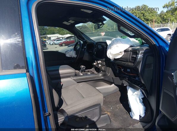 1FTEW1C55PKD73809 2023 FORD F150 Синий Вид салона спереди