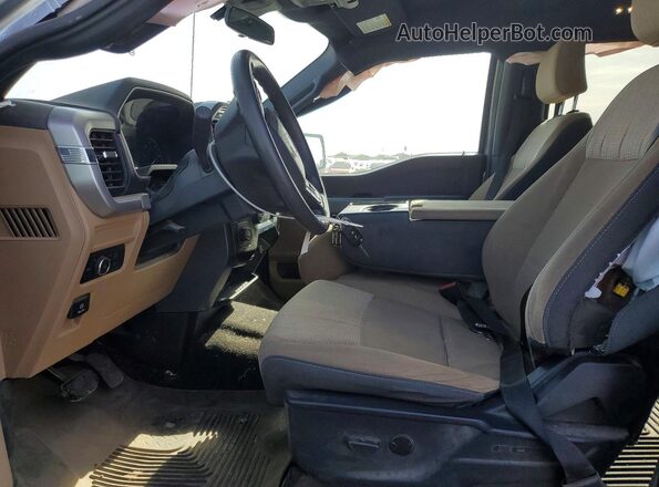 1FTEW1C89PFA25515 2023 FORD F150 Серебряный Вид салона спереди