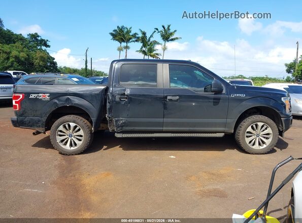 1FTEW1E55JKC26751 2018 FORD F150 Black Vista interior trasera
