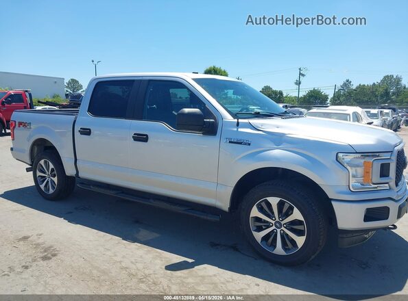 1FTEW1EP1KFD24722 2019 FORD F150 Silver Rear interior view