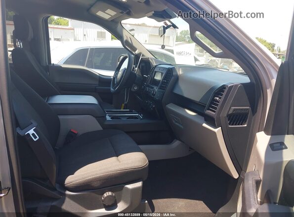 1FTEW1EP1KFD24722 2019 FORD F150 Silver Front interior view