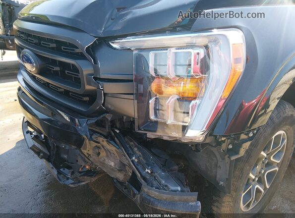 1FTEW1EP4PFA78787 2023 FORD F150 Black Front view