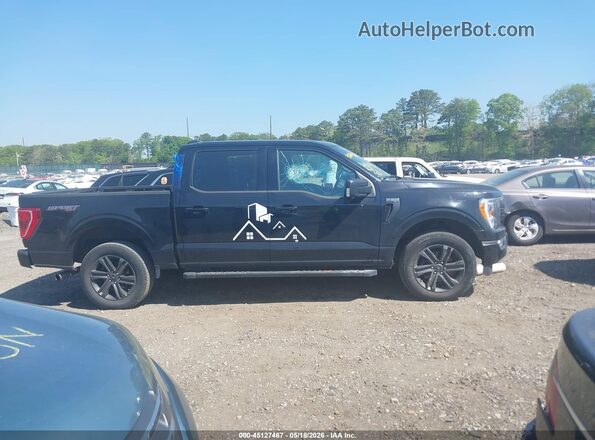 1FTEW1EP7PFA67900 2023 FORD F150 Black Widok wnętrza z tyłu
