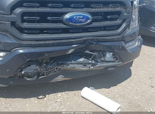 1FTEW1EP7PFA67900 2023 FORD F150 Black Widok z przodu