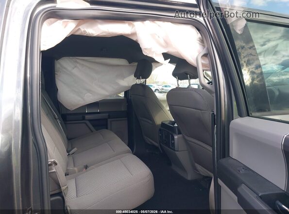 1FTFW1E52JFD18588 2018 FORD F150 Gray Vista de la etiqueta del VIN